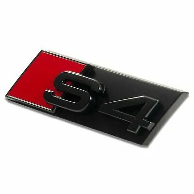 Svart Audi modellbeteckning S4 Grill emblem