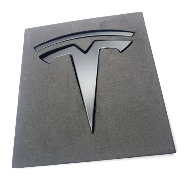Mattsvart Tesla emblem front och baklucka