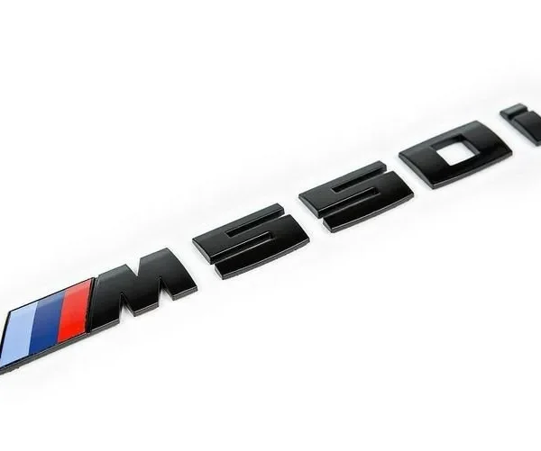 BMW Modellbeteckning M550i Svart 19cm